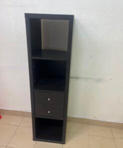 The IKEA KALLAX shelving unit, in black and brown, features a vertical design with built-in drawer units. - Image 7