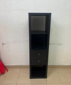 The IKEA KALLAX shelving unit, in black and brown, features a vertical design with built-in drawer units. - Image 10