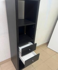 The IKEA KALLAX shelving unit, in black and brown, features a vertical design with built-in drawer units. - Image 11