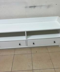 The IKEA HAUGA TV stand in white features a classic design with two drawers and open spaces. - Image 4