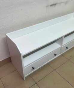 The IKEA HAUGA TV stand in white features a classic design with two drawers and open spaces. - Image 5