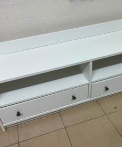 The IKEA HAUGA TV stand in white features a classic design with two drawers and open spaces. - Image 6