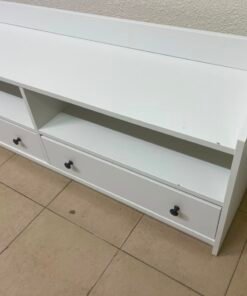 The IKEA HAUGA TV stand in white features a classic design with two drawers and open spaces. - Image 8