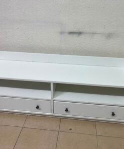 The IKEA HAUGA TV stand in white features a classic design with two drawers and open spaces. - Image 9