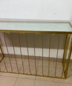Modern console table with a gold metal frame and reflective glass top - Image 7