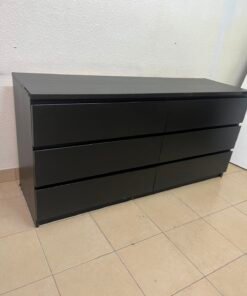 The MALM chest of drawers from IKEA, in black and brown, features a simple and modern design. - Image 4