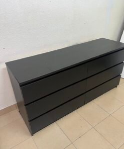 The MALM chest of drawers from IKEA, in black and brown, features a simple and modern design. - Image 5