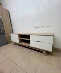 The Lucid TV unit from Home Centre features a simple geometric wood design with white drawers. - Image 10