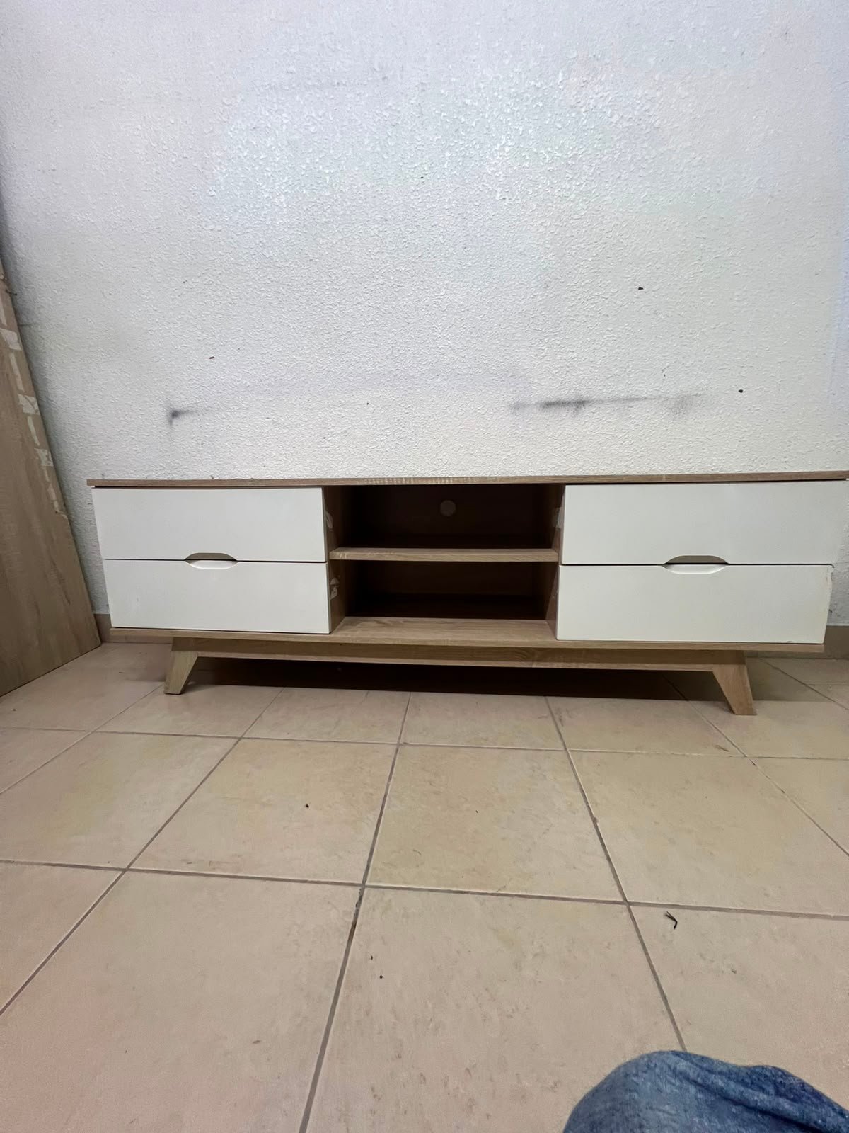 The Lucid TV unit from Home Centre features a simple geometric wood design with white drawers. - Image 7