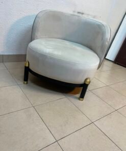 The chair is a Grayson model from Casarina Interiors, featuring a curved velvet seat and gold metal legs. - Image 6