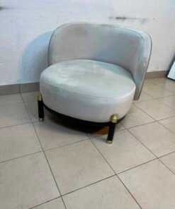 The chair is a Grayson model from Casarina Interiors, featuring a curved velvet seat and gold metal legs. - Image 4