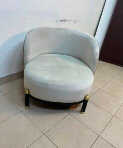 The chair is a Grayson model from Casarina Interiors, featuring a curved velvet seat and gold metal legs. - Image 9