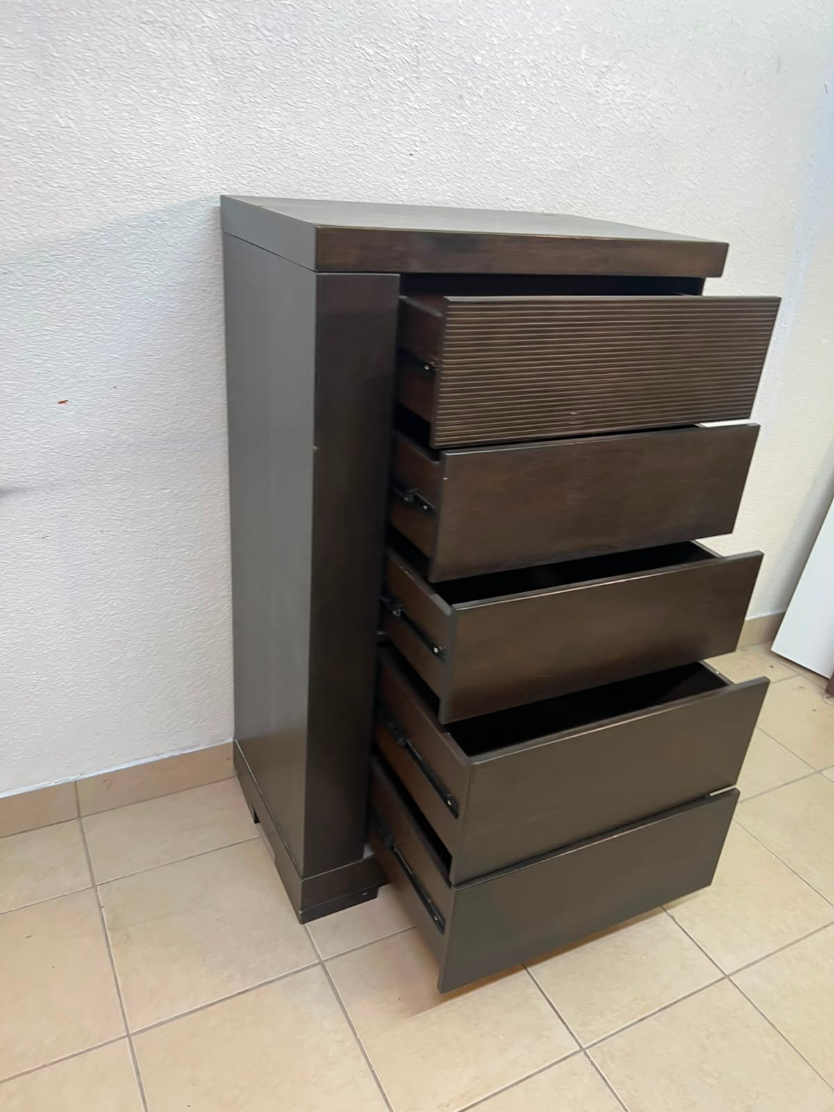 A Home Centre Geneva-style chest of drawers, featuring a dark brown color and solid wood design with 5 drawers. - Image 10
