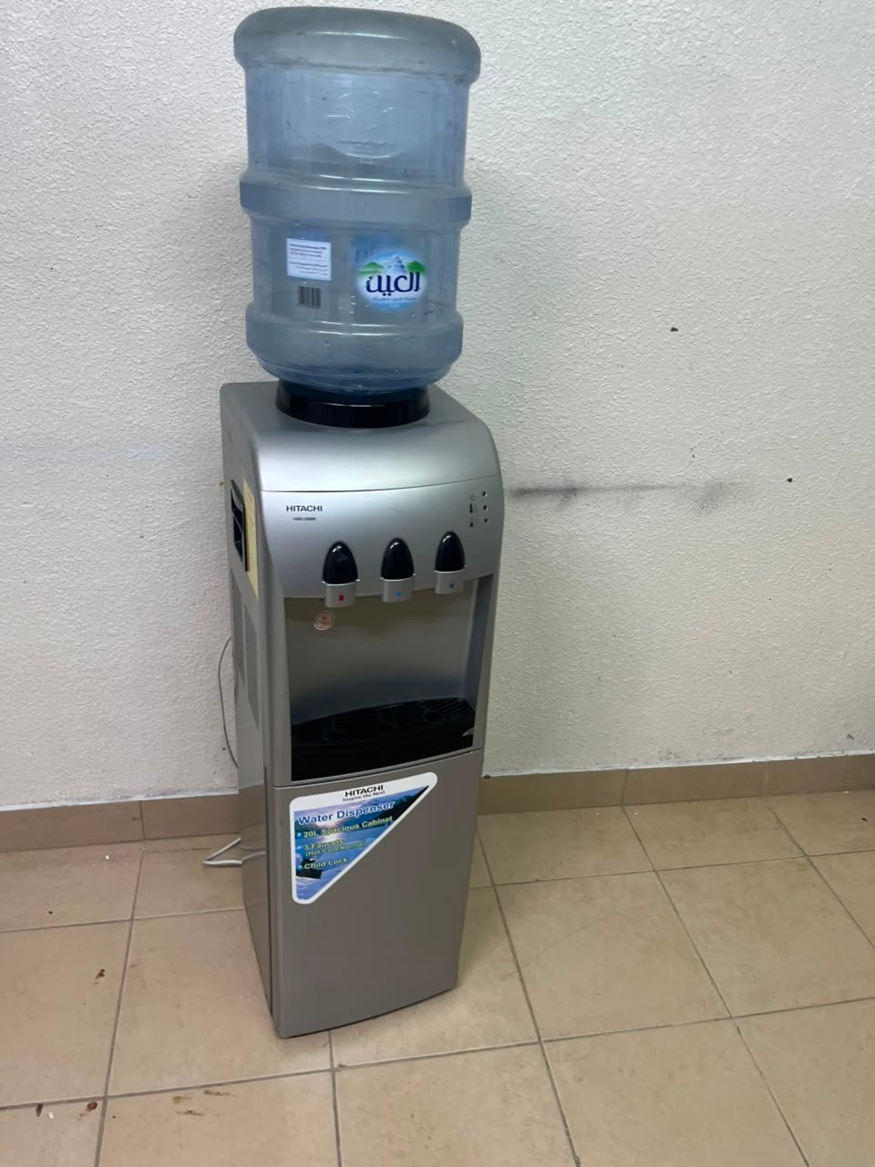 Hitachi Top-Loading Water Dispenser – Silver Freestanding Cooler with Hot, Cold & Room Temperature Taps, Compressor Cooling & Bottom Storage Cabinet - Image 3