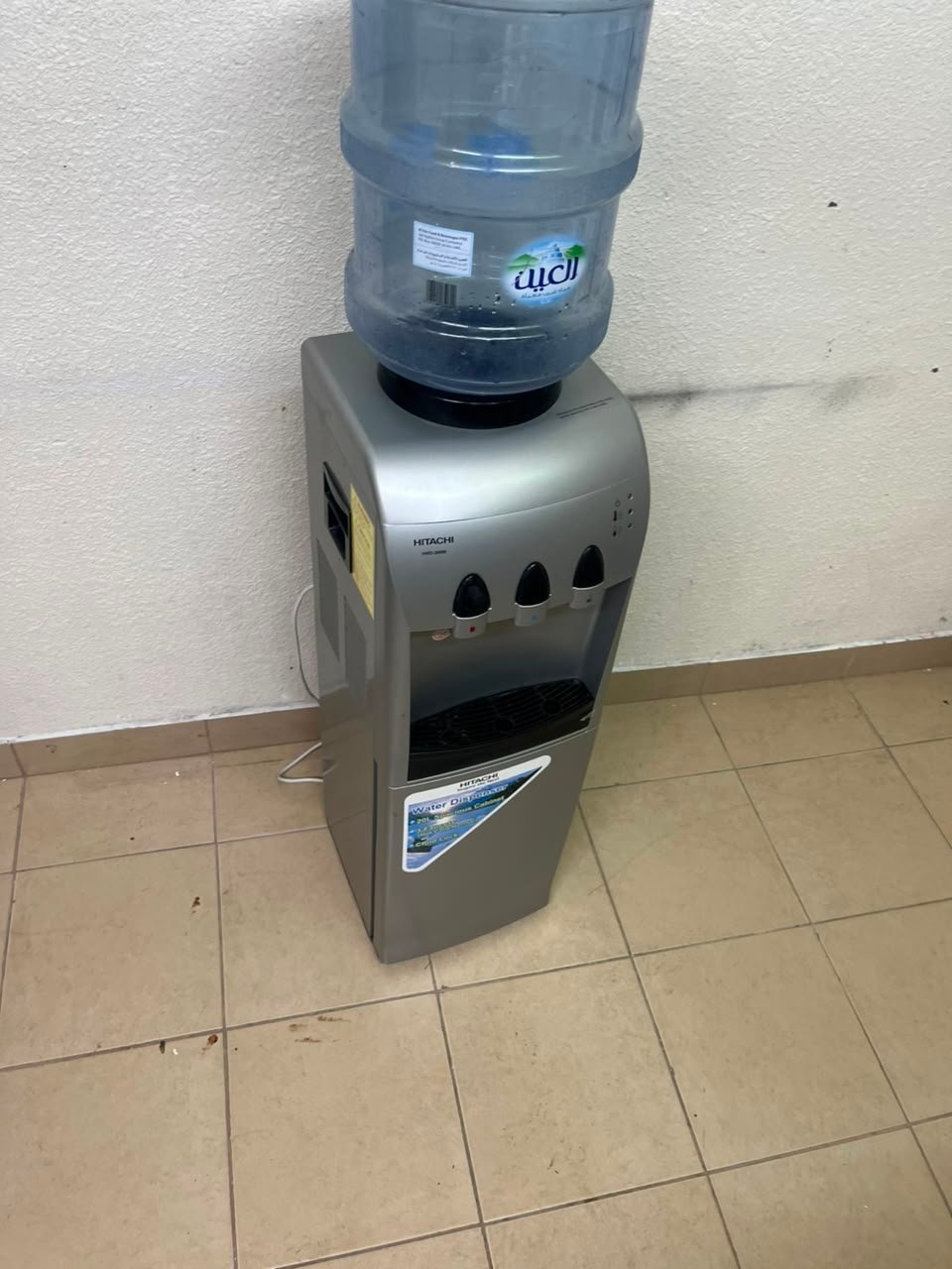 Hitachi Top-Loading Water Dispenser – Silver Freestanding Cooler with Hot, Cold & Room Temperature Taps, Compressor Cooling & Bottom Storage Cabinet - Image 7