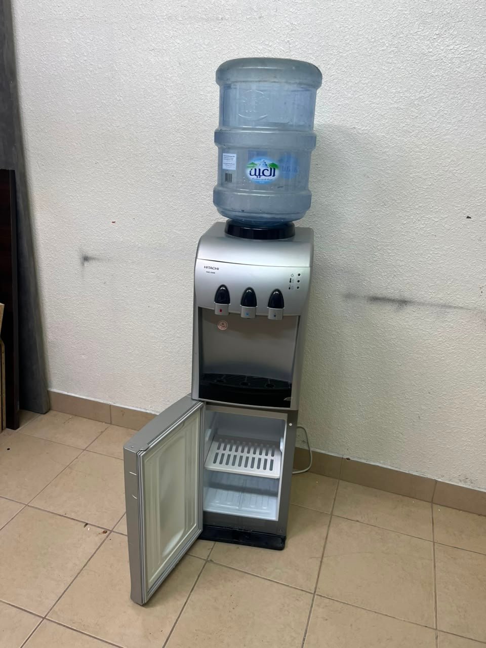 Hitachi Top-Loading Water Dispenser – Silver Freestanding Cooler with Hot, Cold & Room Temperature Taps, Compressor Cooling & Bottom Storage Cabinet - Image 8