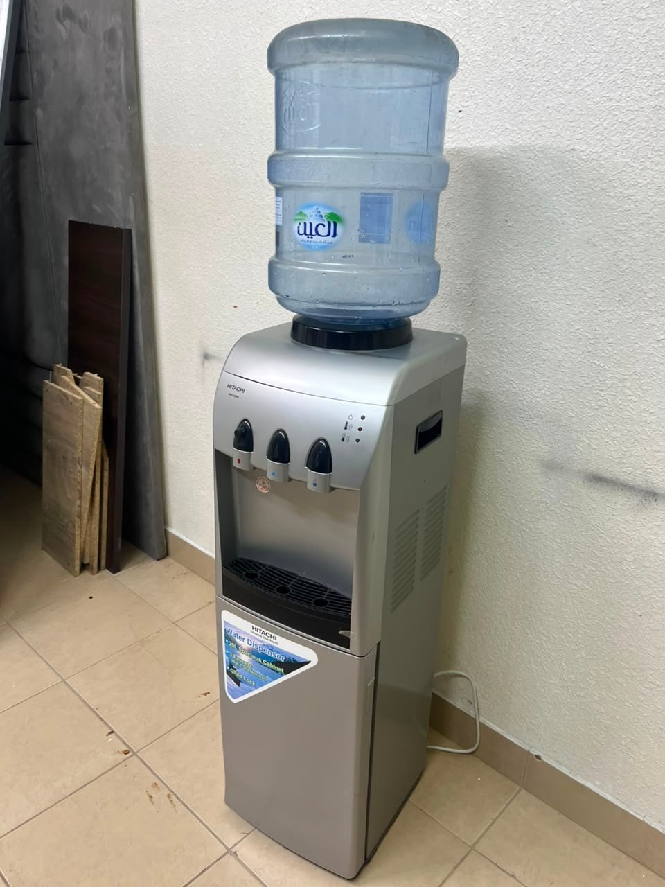Hitachi Top-Loading Water Dispenser – Silver Freestanding Cooler with Hot, Cold & Room Temperature Taps, Compressor Cooling & Bottom Storage Cabinet - Image 9