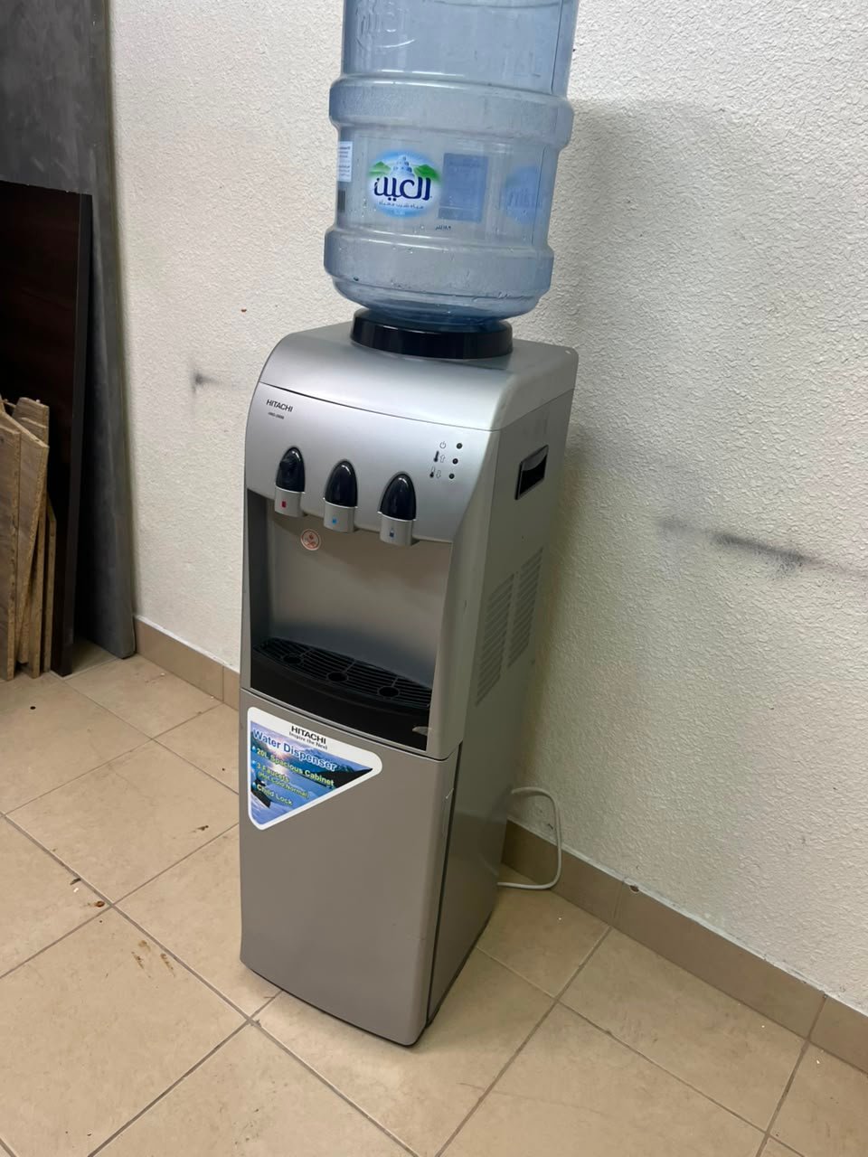 Hitachi Top-Loading Water Dispenser – Silver Freestanding Cooler with Hot, Cold & Room Temperature Taps, Compressor Cooling & Bottom Storage Cabinet - Image 10