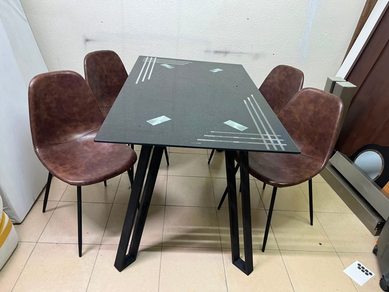 Modern 5-Piece Dining Set – Black Rectangular Table with Geometric Metal Legs & 4 Brown Faux Leather Chairs with Slim Black Legs