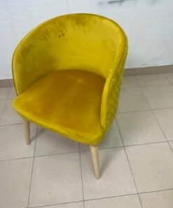 The modern chair features luxurious yellow velvet upholstery, a curved back with a padded design on the sides, and sturdy wooden legs. - Image 7