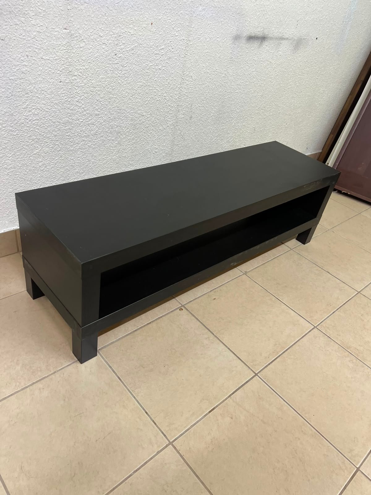 The image shows a TV stand from the IKEA LACK collection in black and brown. - Image 6