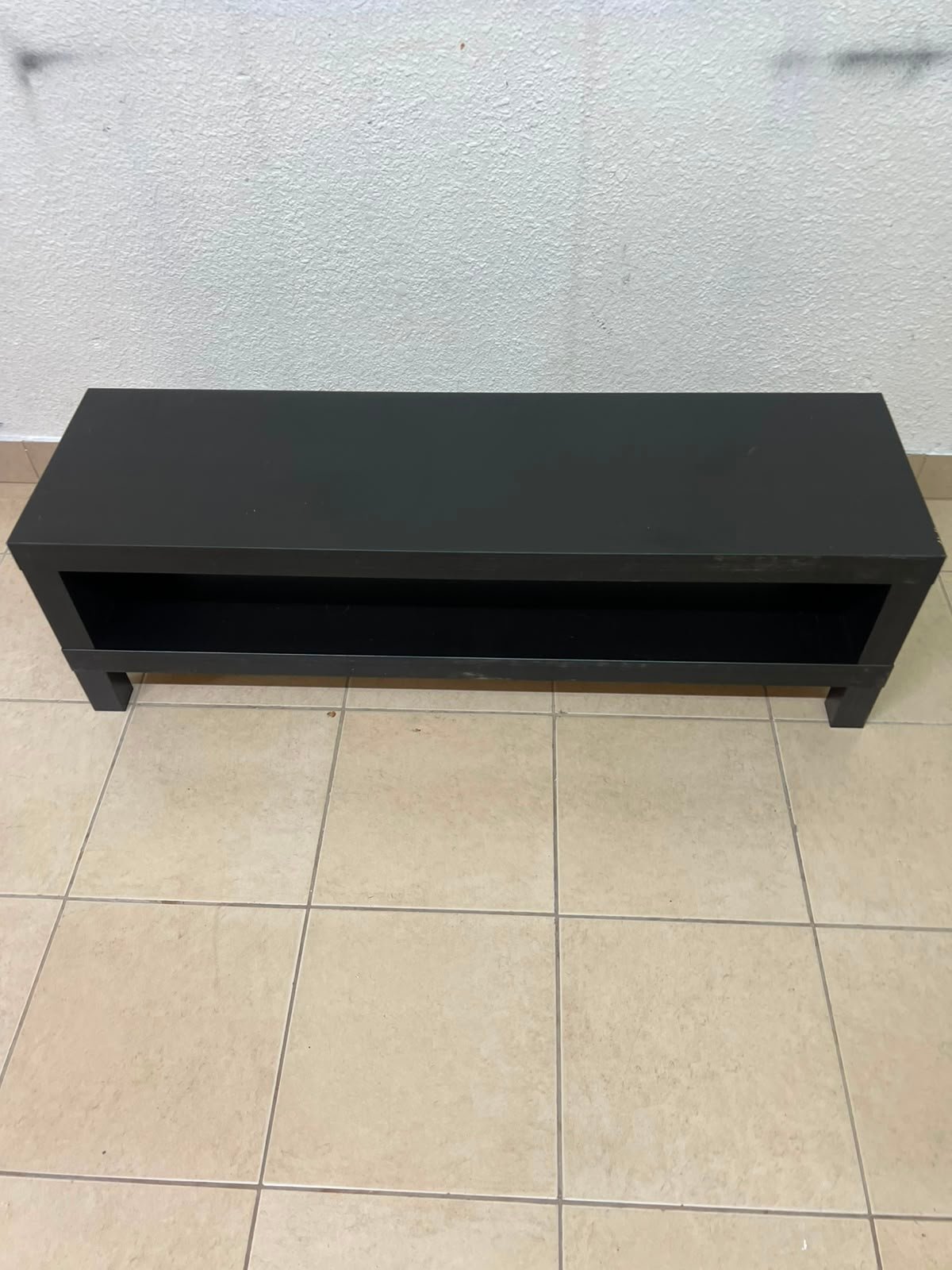 The image shows a TV stand from the IKEA LACK collection in black and brown. - Image 3