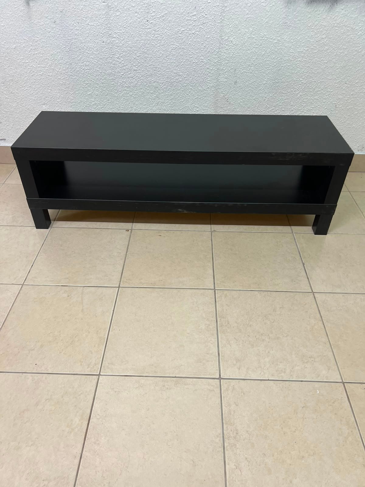The image shows a TV stand from the IKEA LACK collection in black and brown. - Image 4