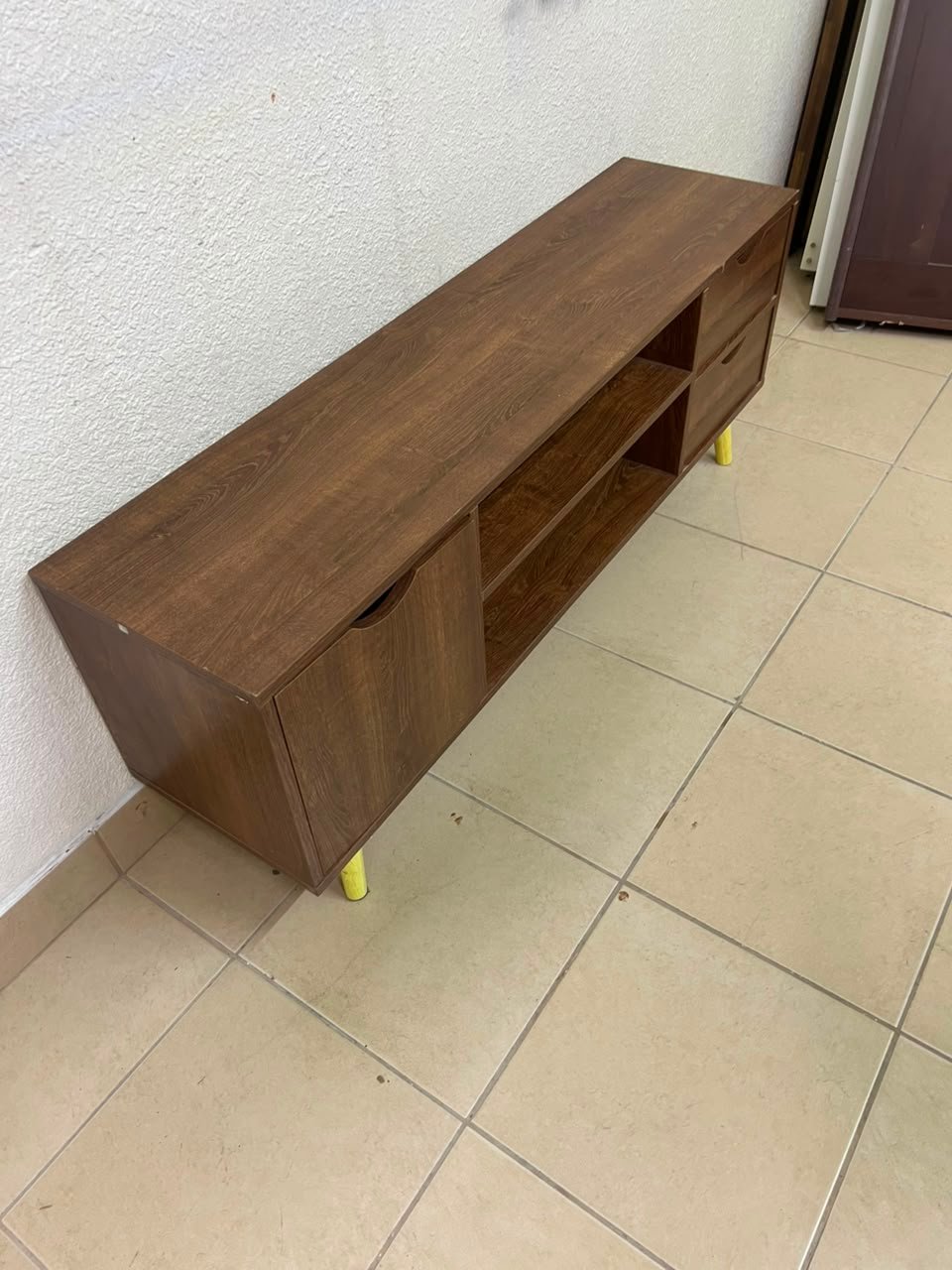 A Mid-Century Modern wood-design TV unit featuring open cabinets and shelves, side drawers, and distinctive legs. - Image 4
