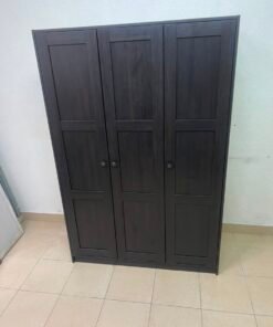 The RAKKESTAD wardrobe from IKEA has three doors and comes in a black-brown color, measuring 117x176 cm. - Image 8