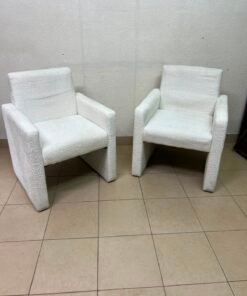 A modern white boucle fabric armchair, featuring an elegant base with flat legs and textured fabric upholstery. - Image 8