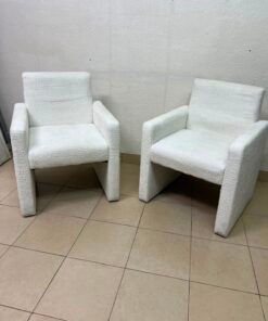 A modern white boucle fabric armchair, featuring an elegant base with flat legs and textured fabric upholstery. - Image 5