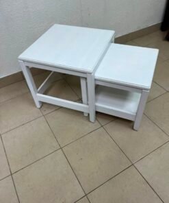 IKEA's Havista nesting table set (2-piece set in white), made of solid pine wood.