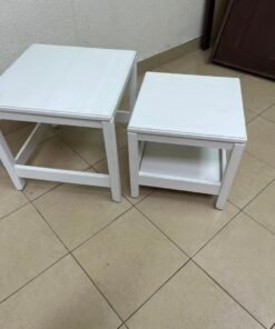 IKEA's Havista nesting table set (2-piece set in white), made of solid pine wood. - Image 2
