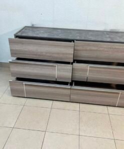 This is a Home Centre Warner 6-Drawer Dresser featuring a caramel walnut and beige finish with a marble-effect top. - Image 4