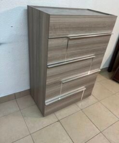 The Warner Chest of 5-Drawers from Homecentre features a beige and caramel walnut finish with distinct long metallic handles. - Image 4