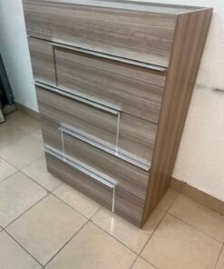 The Warner Chest of 5-Drawers from Homecentre features a beige and caramel walnut finish with distinct long metallic handles. - Image 12