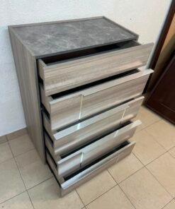 The Warner Chest of 5-Drawers from Homecentre features a beige and caramel walnut finish with distinct long metallic handles. - Image 9
