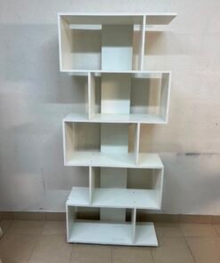 This white 5-tier geometric S-shaped bookshelf functions as an open display rack or room divider. - Image 2