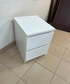 The IKEA MALM two-drawer chest of drawers in white is typically used as a bedside table or small storage unit. - Image 6
