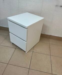 The IKEA MALM two-drawer chest of drawers in white is typically used as a bedside table or small storage unit. - Image 2