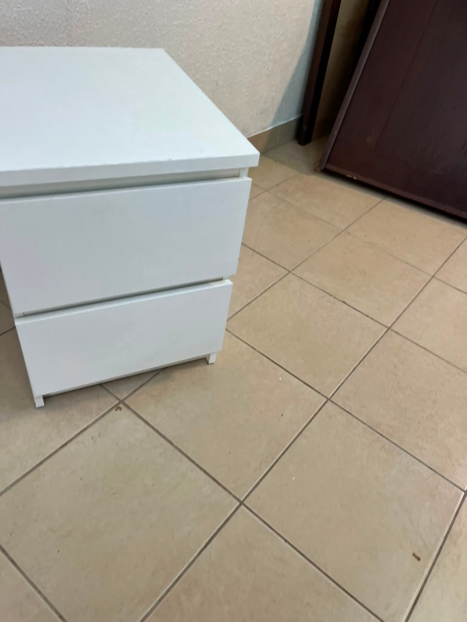 The IKEA MALM two-drawer chest of drawers in white is typically used as a bedside table or small storage unit. - Image 5