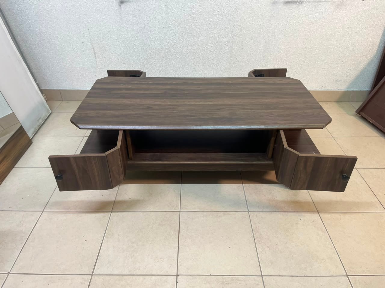 Tough-wearing walnut-finish wooden coffee table featuring a rectangular top, lower storage shelf, and subtle corner detailing. - Image 5