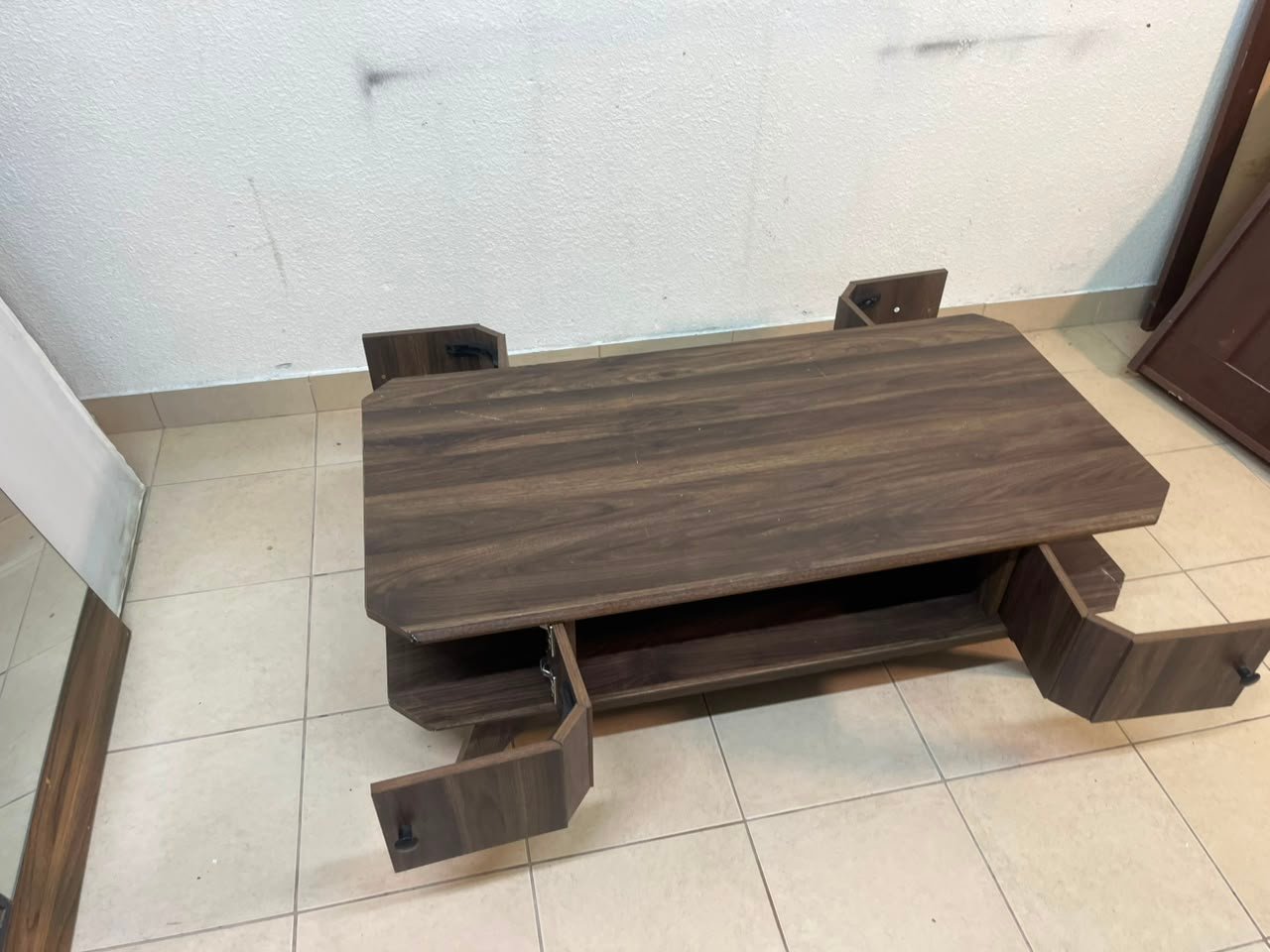 Tough-wearing walnut-finish wooden coffee table featuring a rectangular top, lower storage shelf, and subtle corner detailing. - Image 6