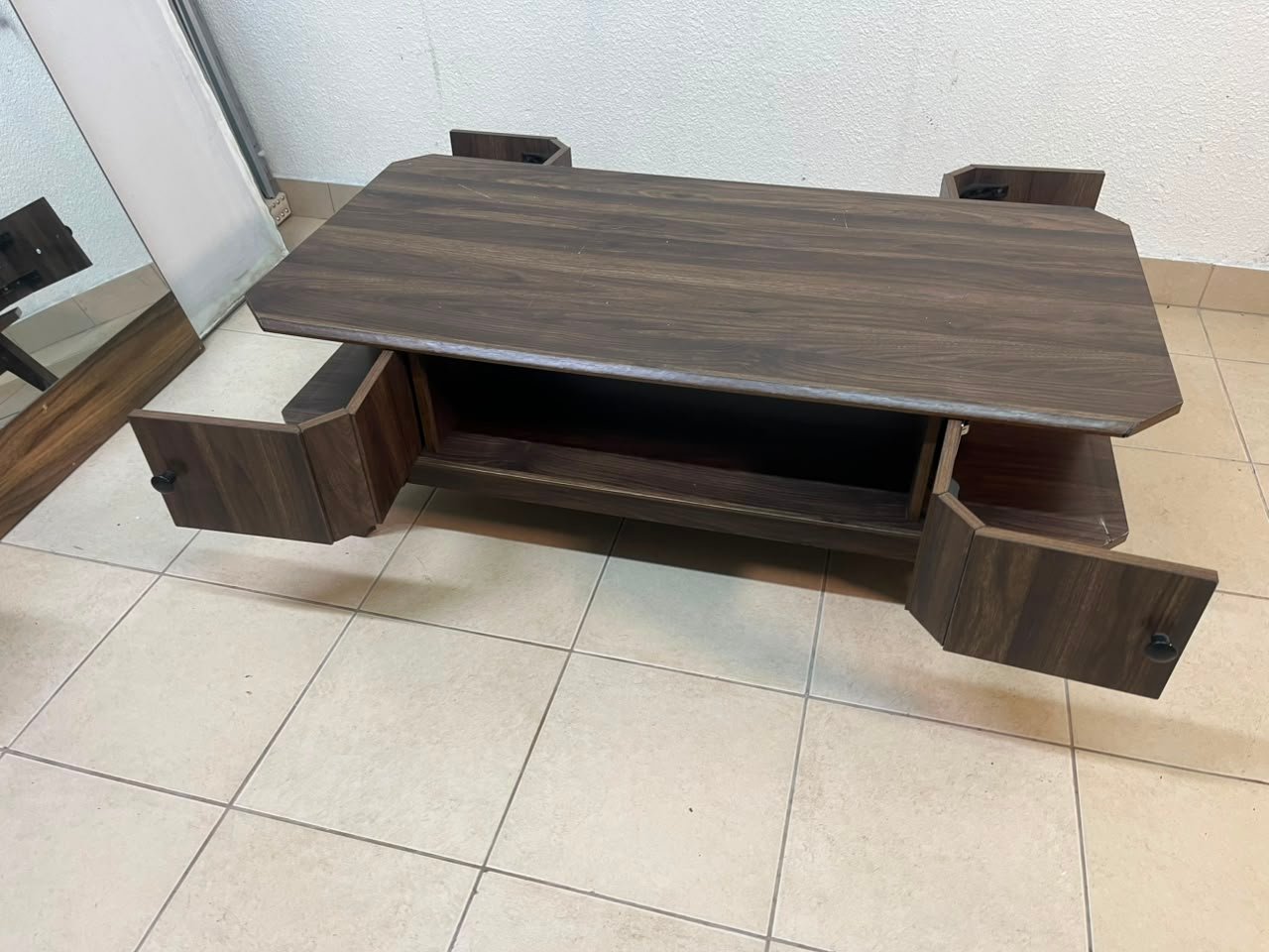 Tough-wearing walnut-finish wooden coffee table featuring a rectangular top, lower storage shelf, and subtle corner detailing. - Image 3