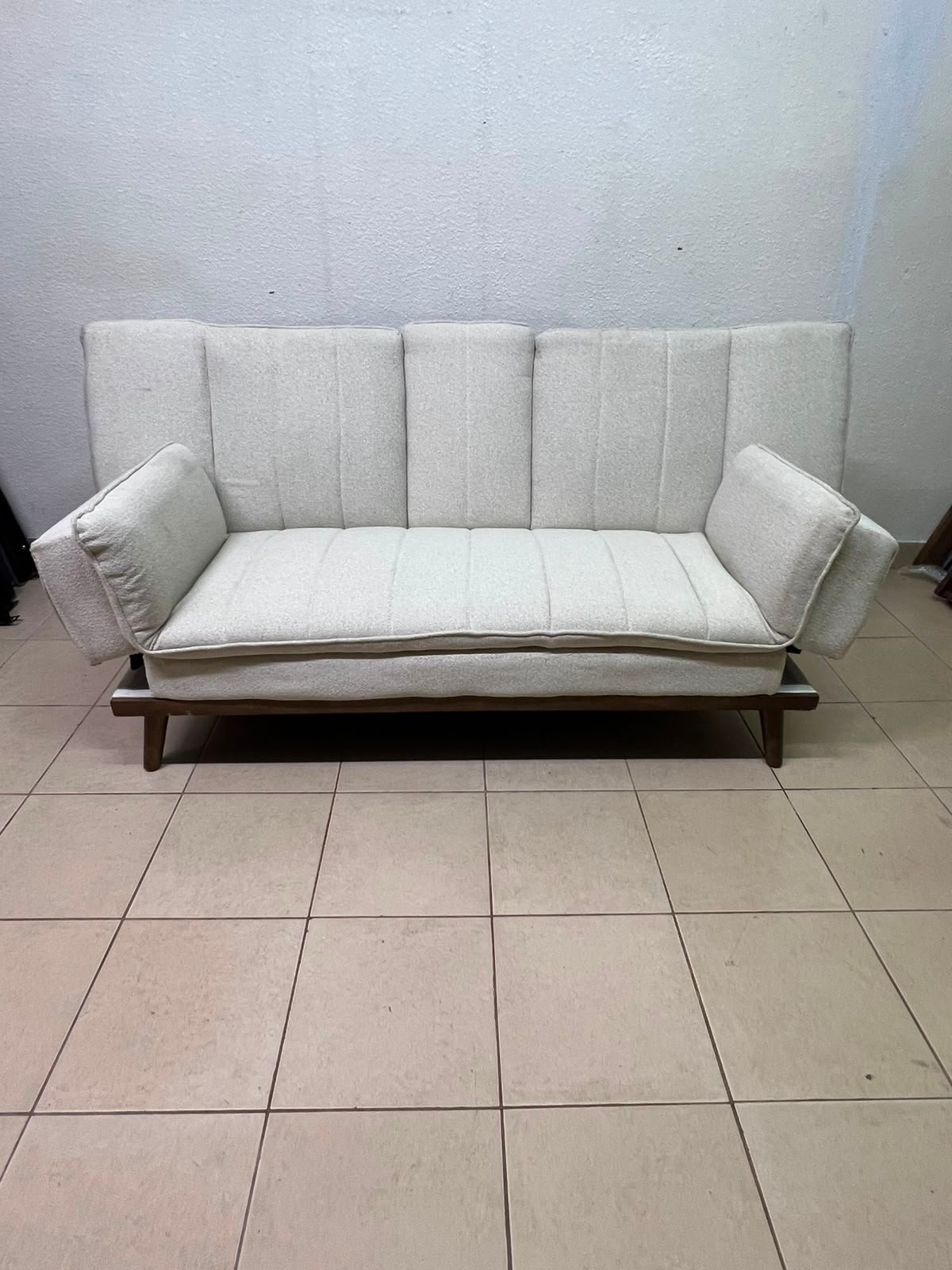 Mid-Century Modern Cream/Off-White Convertible Futon Sofa Bed – Vertical Tufted Backrest, Tapered Wood Legs & Removable Cup Holder Armrests - Image 4