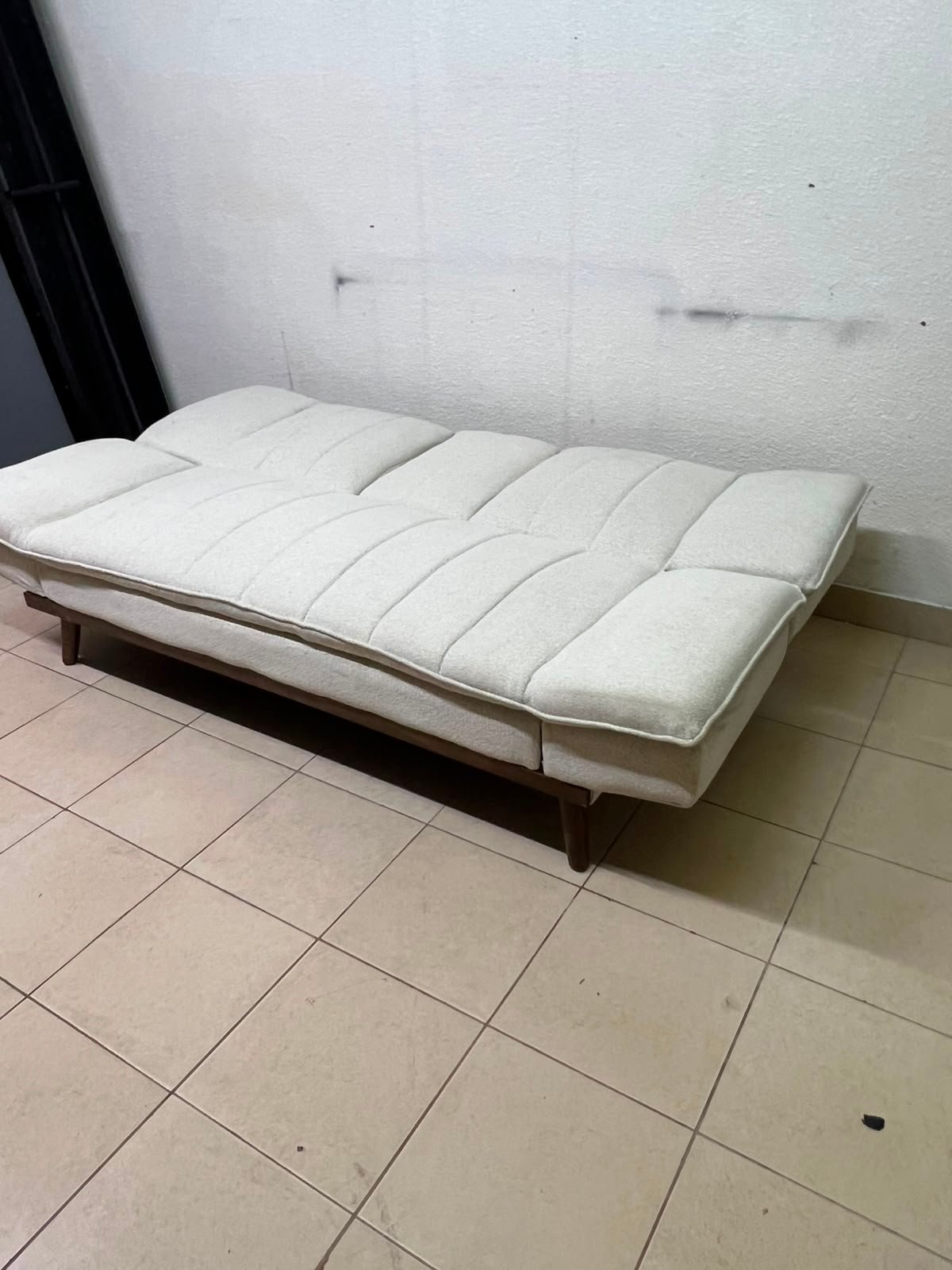 Mid-Century Modern Cream/Off-White Convertible Futon Sofa Bed – Vertical Tufted Backrest, Tapered Wood Legs & Removable Cup Holder Armrests - Image 9