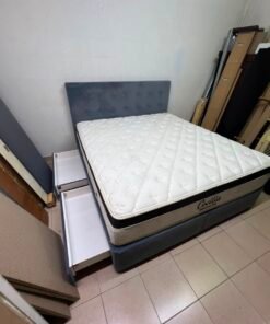 A modern, gray, upholstered double bed, paired with a thick, padded mattress with a soft top layer, featuring a prominent black border. - Image 8