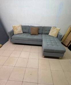 This is a three-seater corner sofa from IKEA in gray, featuring upholstered seat cushions and light-colored pointed wooden legs. - Image 5