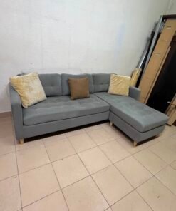 This is a three-seater corner sofa from IKEA in gray, featuring upholstered seat cushions and light-colored pointed wooden legs. - Image 7