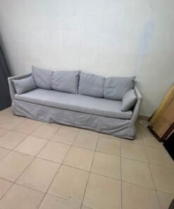 This IKEA HYLTARP three-seater sofa in Gransel grey features a sleek, minimalist cover design with matching soft back cushions and supportive arm cushions.